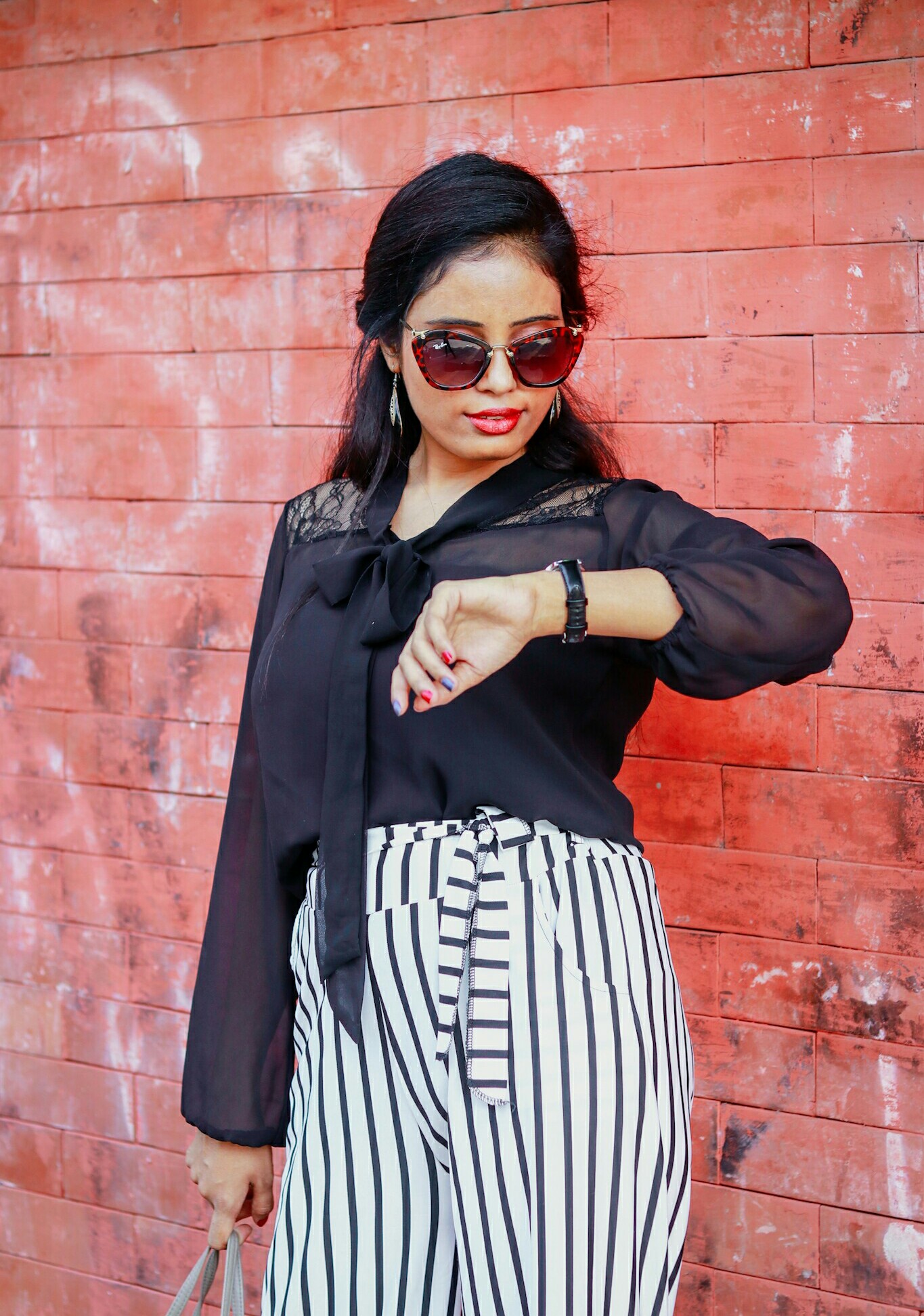 How to Wear Striped Pants 6 Chic Outfit Ideas From Fashion Bloggers
